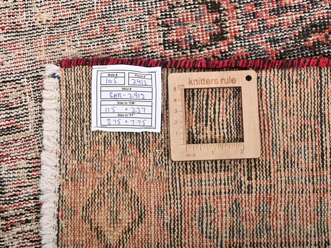 a piece of wood sitting on top of a rug