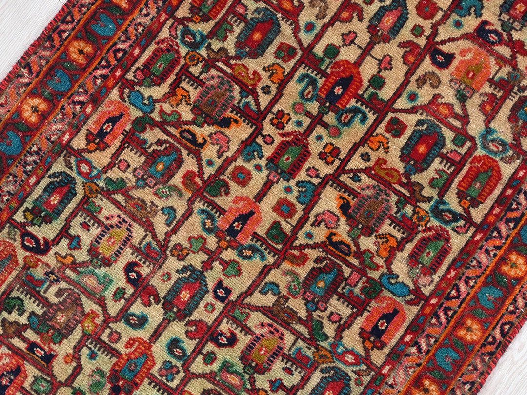 a red and blue rug on a white floor