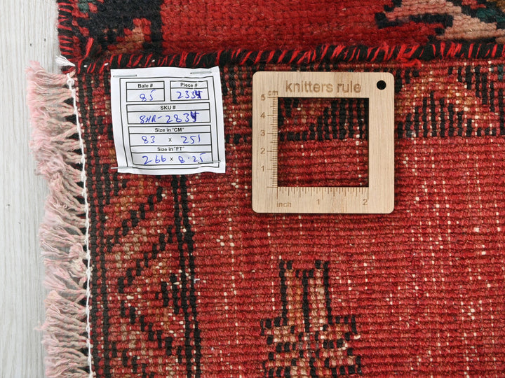 a piece of cloth with a ruler on top of it