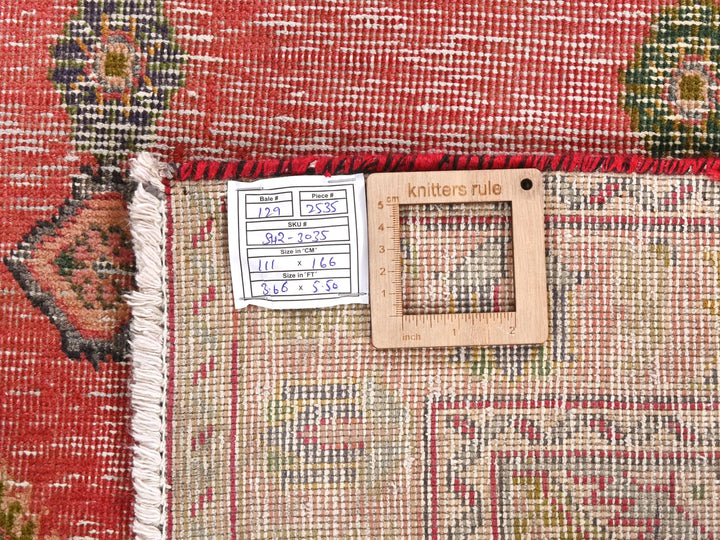 a close up of a rug with a wooden frame