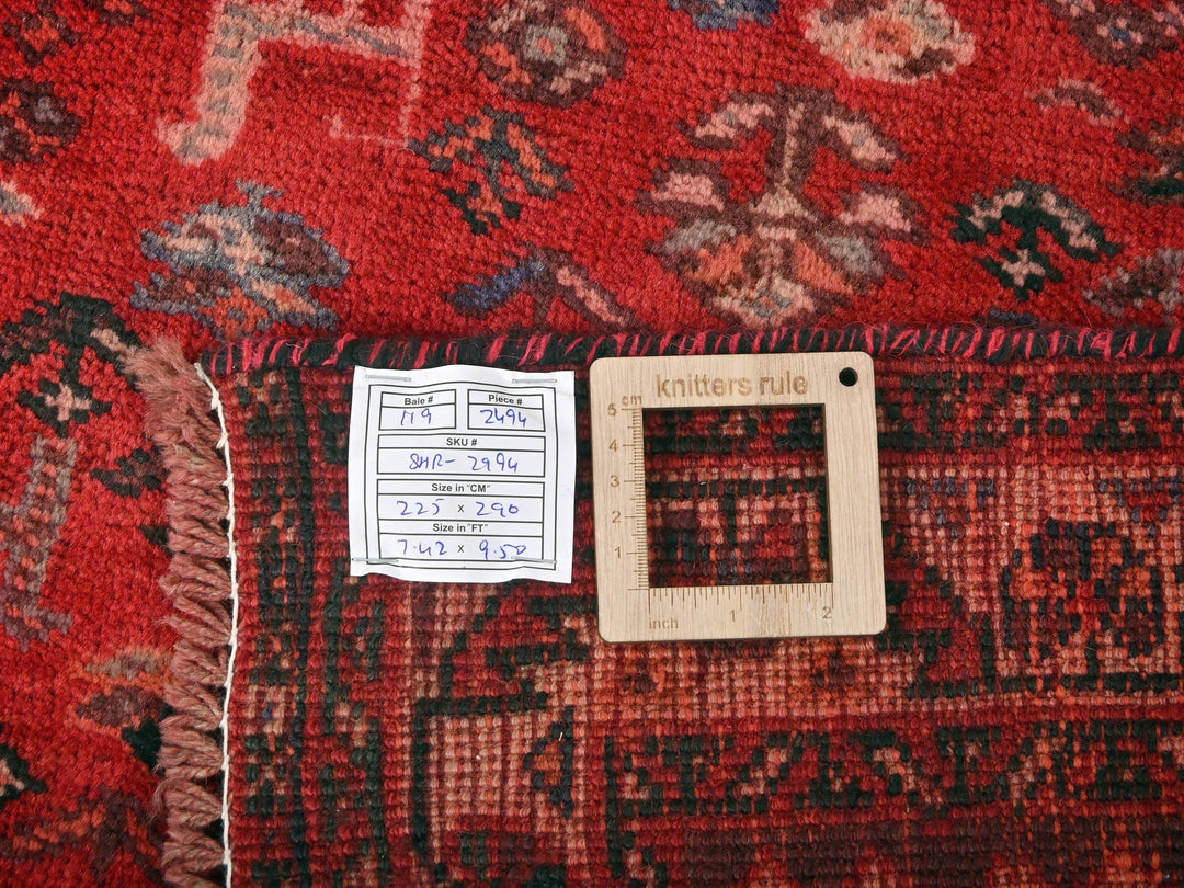 a piece of wood sitting on top of a rug