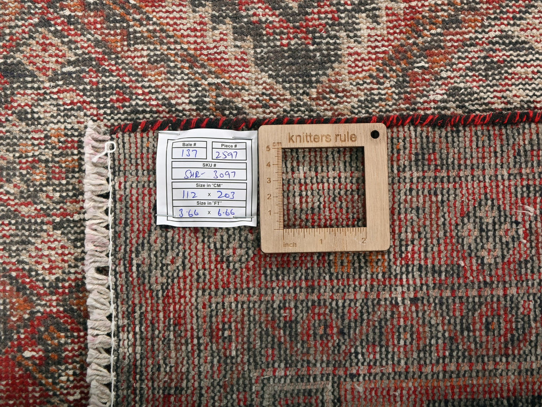 a piece of wood sitting on top of a rug