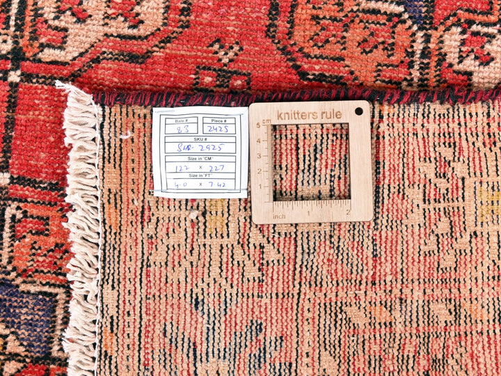 a pile of rugs with a price label on them