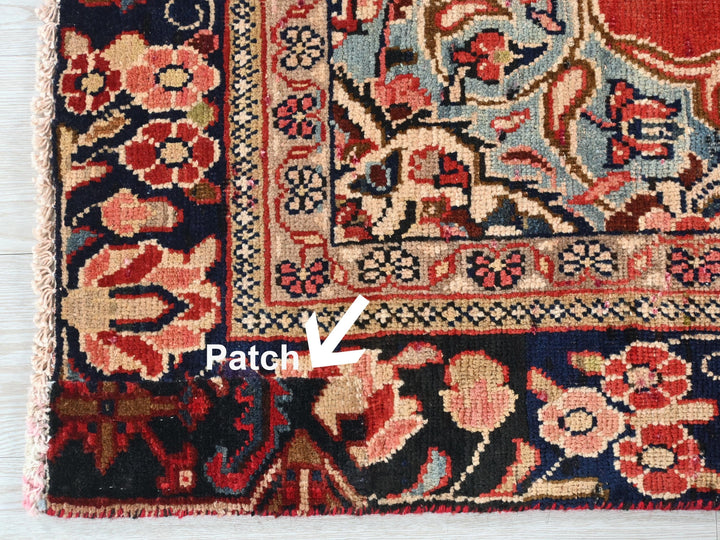 a close up of a rug on a wooden floor