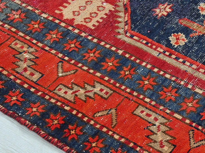 a close up of a rug on a wooden floor