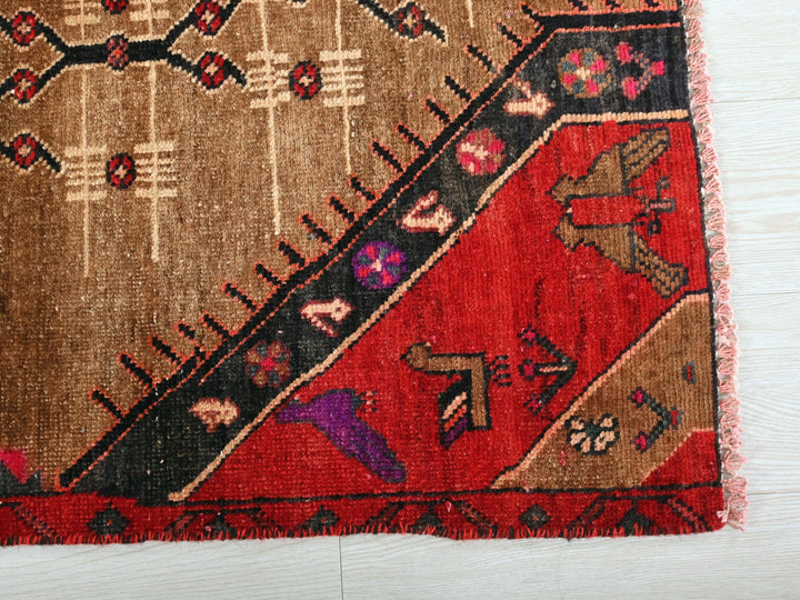 a close up of a rug on a wooden floor