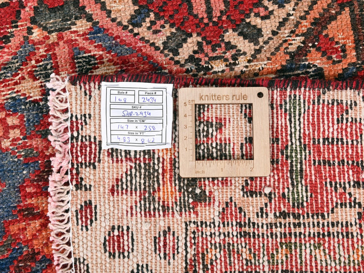 a close up of a rug with a tag on it