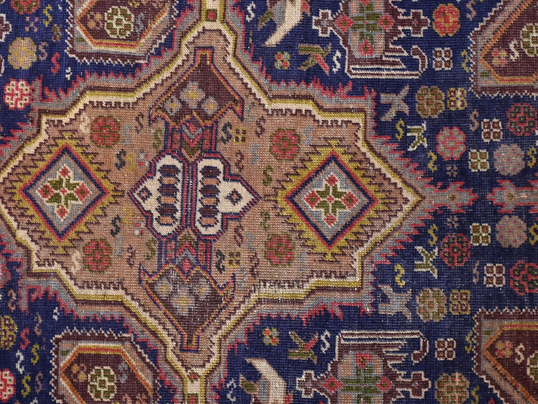 a close up of a rug with many different colors