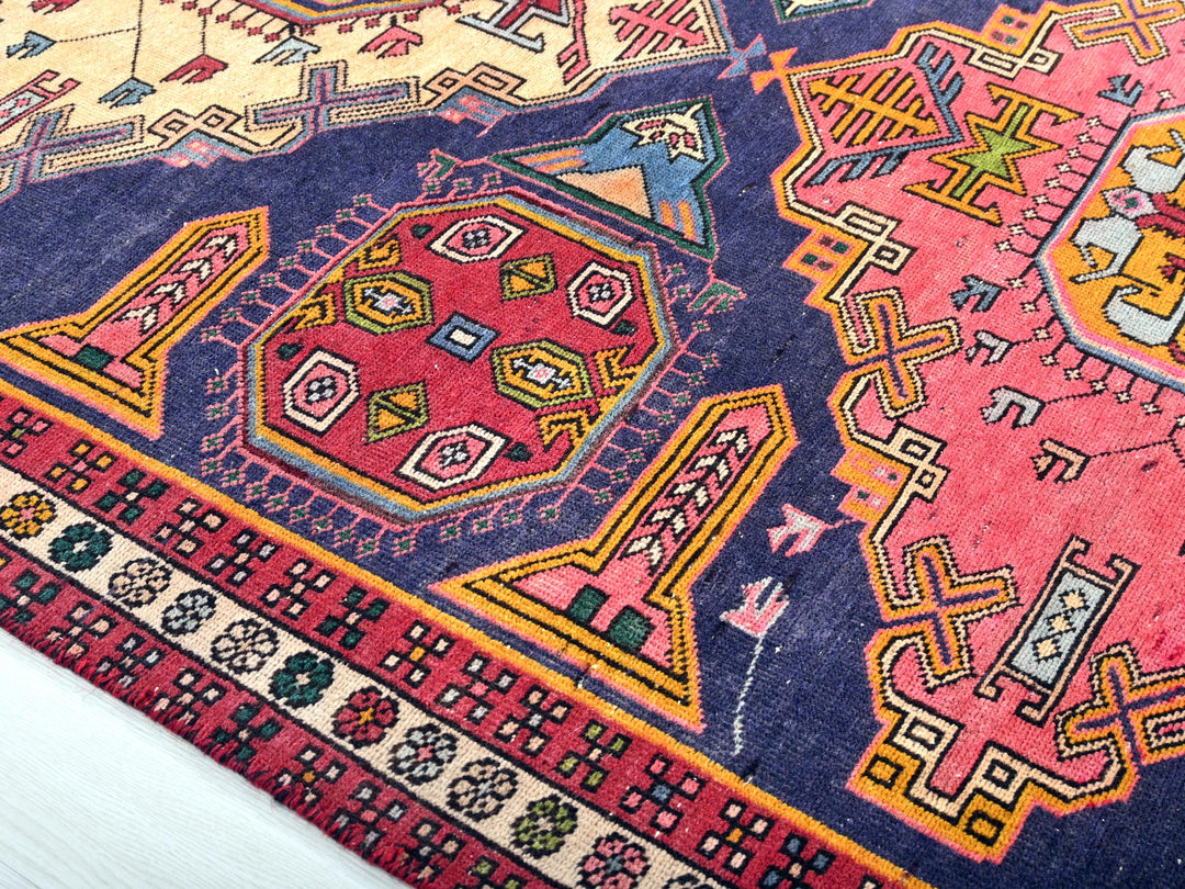 a colorful oriental rug is laying on the floor