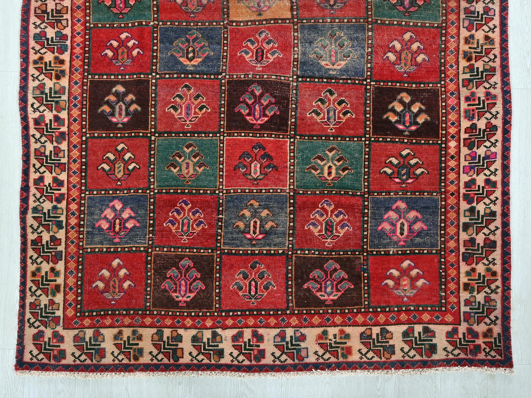 a multicolored rug with a design on it