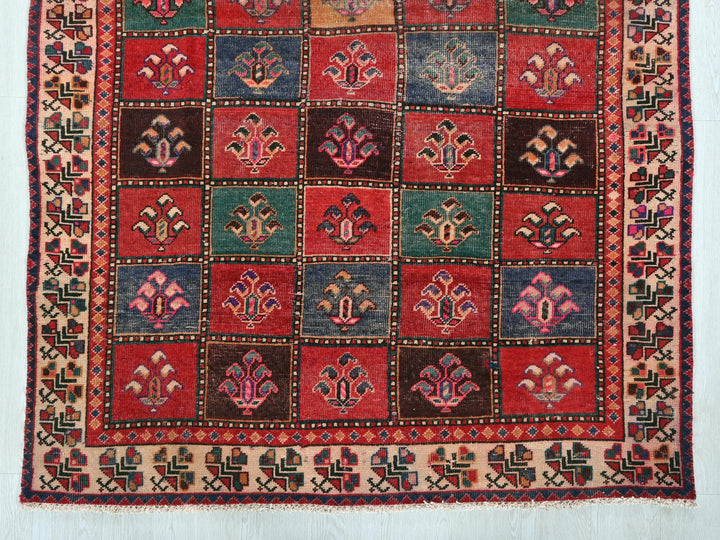 a multicolored rug with a design on it