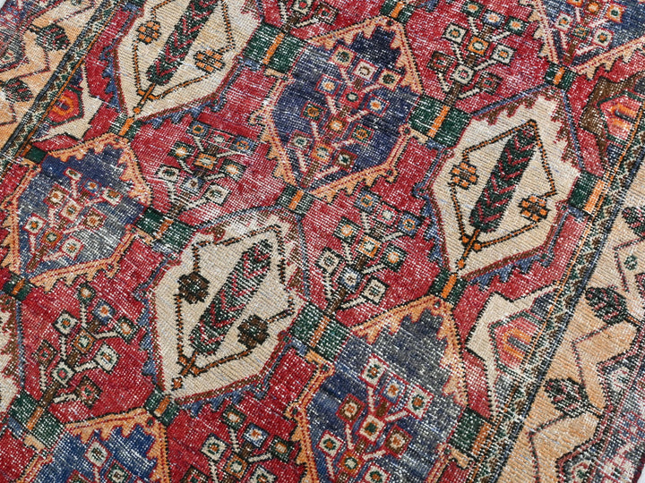 a multicolored oriental rug with an intricate design