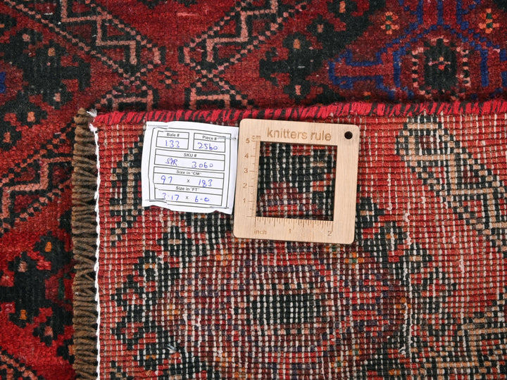 a piece of wood sitting on top of a rug