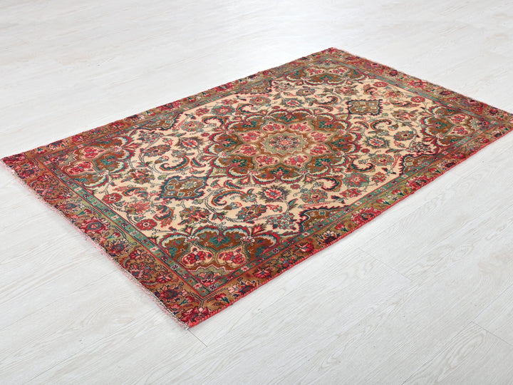 a rug is laying on a white floor