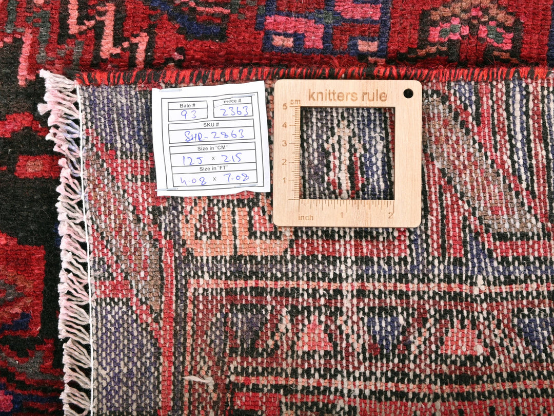 a piece of wood sitting on top of a rug
