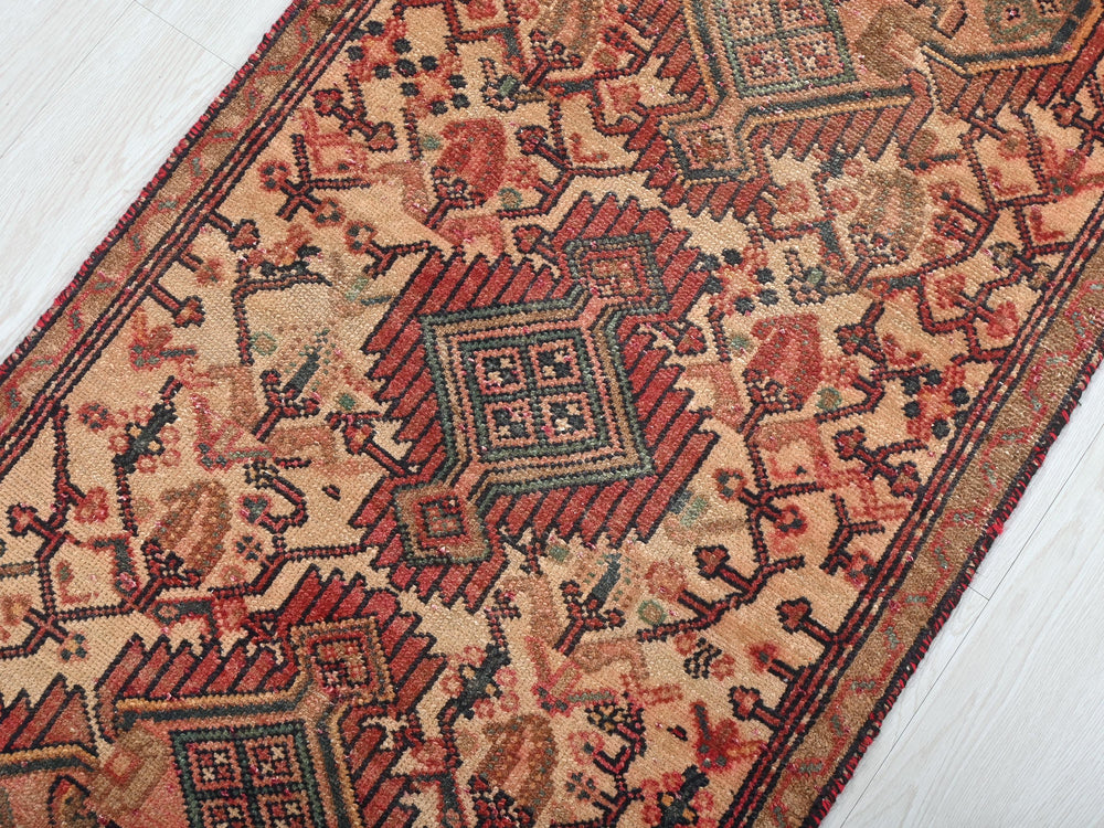 an old rug is laying on the floor