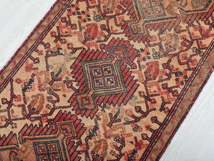 an old rug is laying on the floor