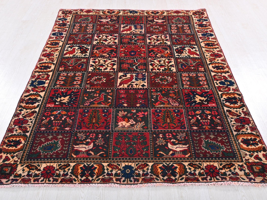 a red and blue rug on a white floor