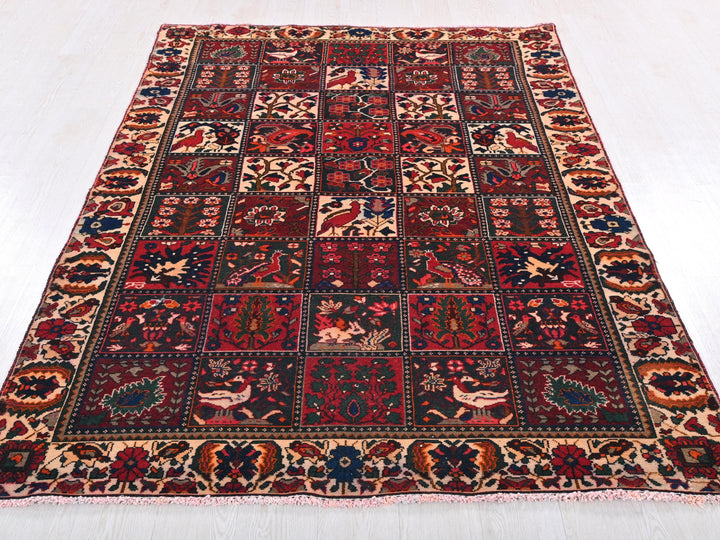 a red and blue rug on a white floor