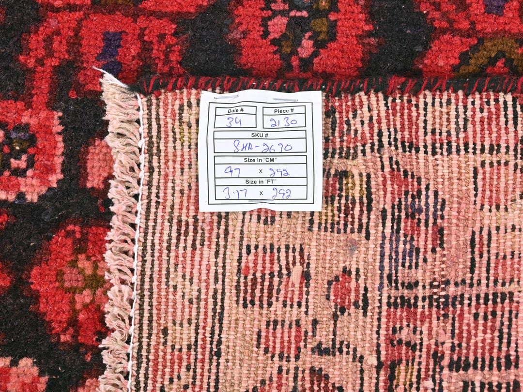 a close up of a rug with a tag on it