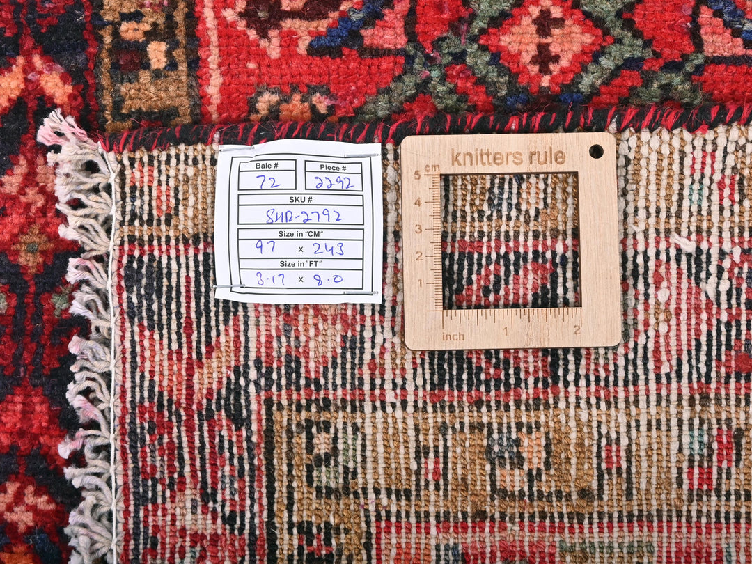 a piece of wood sitting on top of a rug