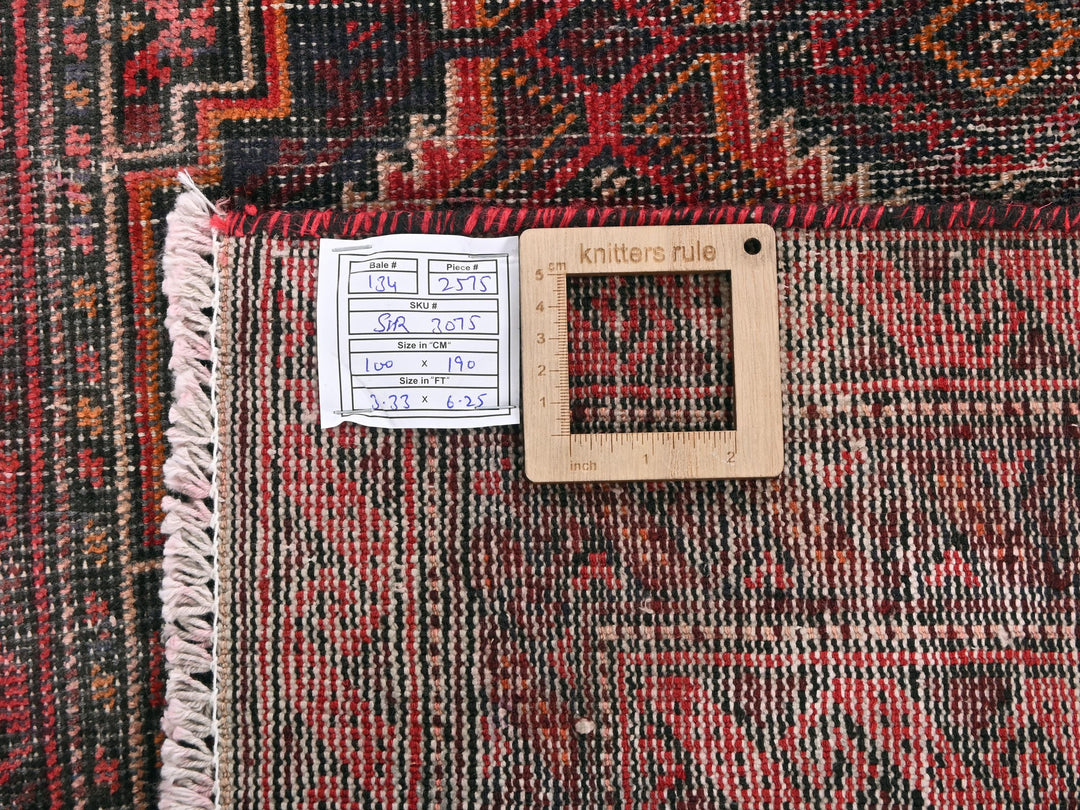 a piece of wood sitting on top of a rug