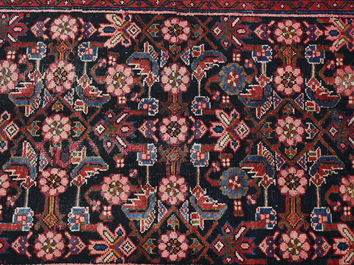an oriental rug with a floral design on it