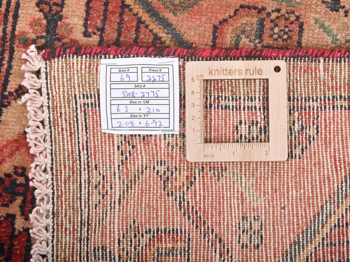 a piece of cloth with a ruler on top of it