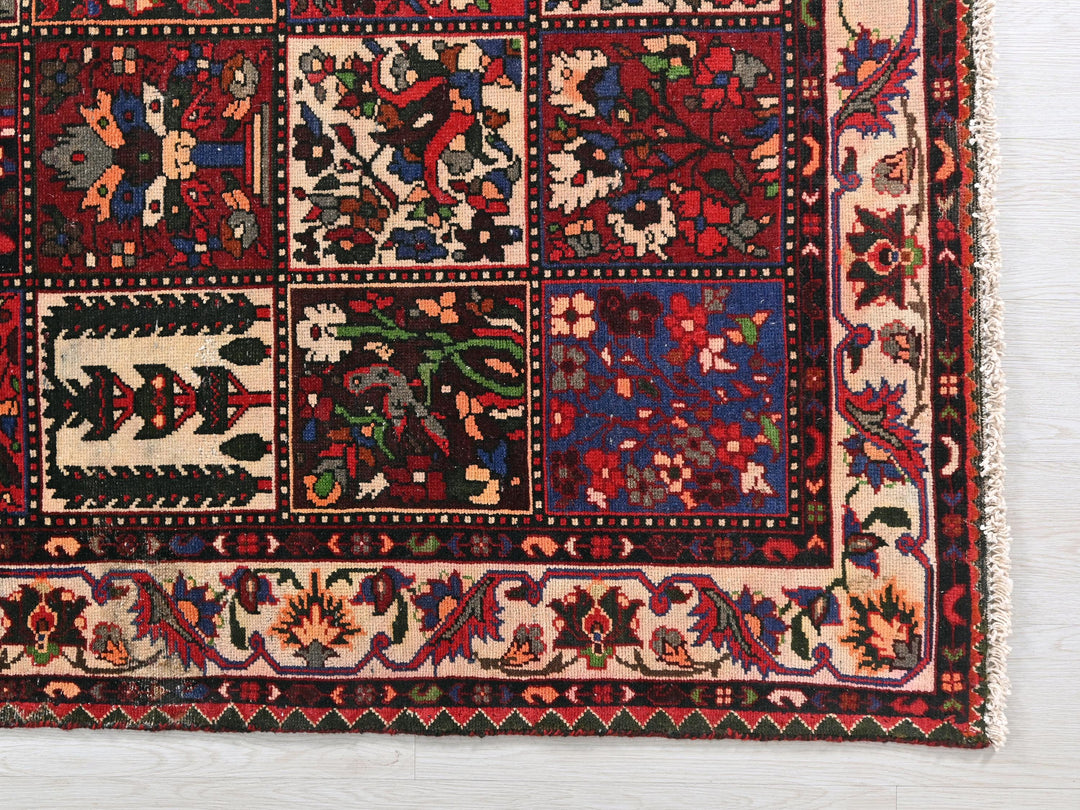 a multicolored rug with a patchwork design