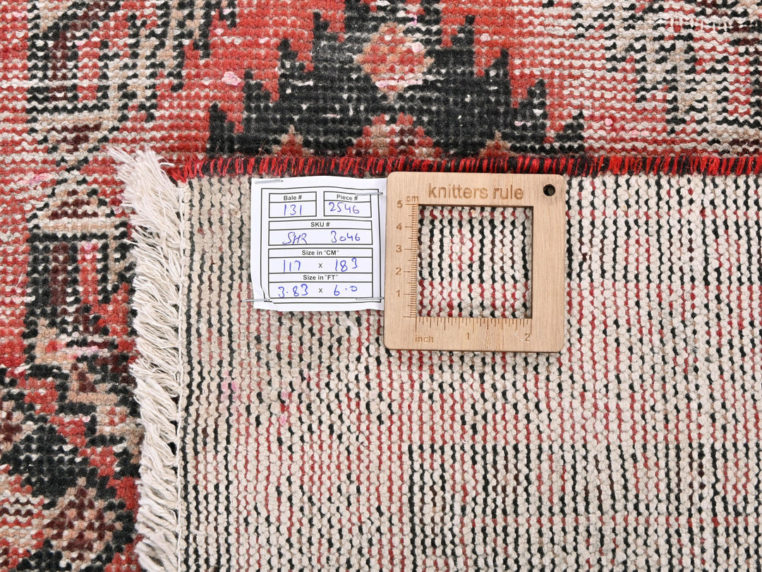 a piece of wood sitting on top of a rug