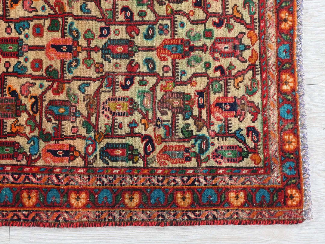 an old rug with a colorful design on it