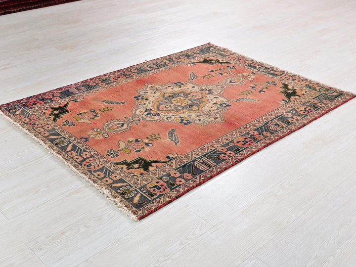 a rug on the floor of a room