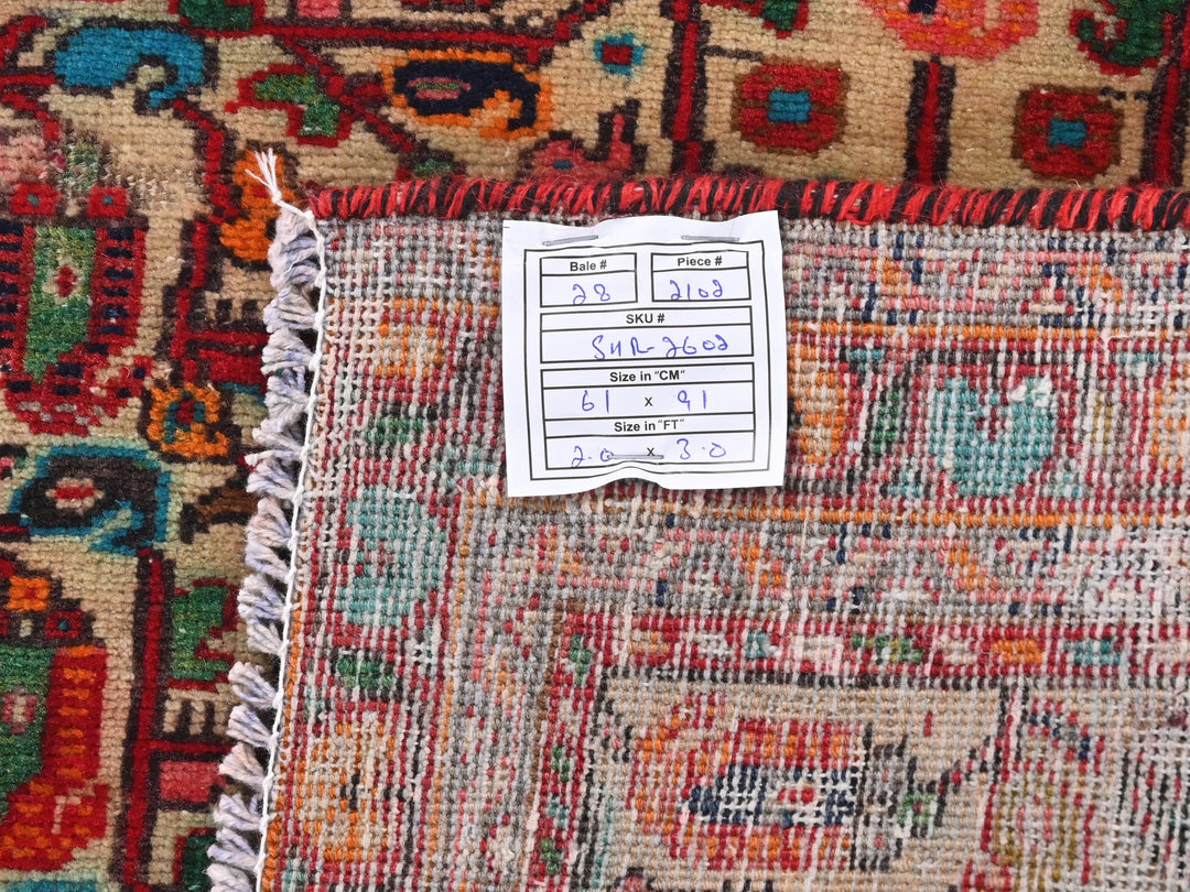 a close up of a rug with a tag on it