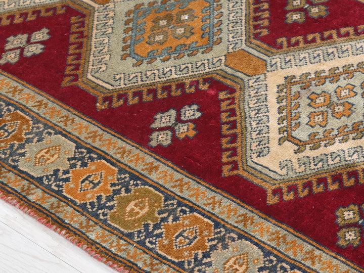 a close up of a rug on a wooden floor