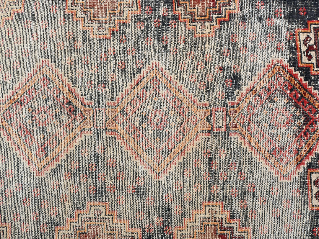 a rug with a pattern on the middle of it