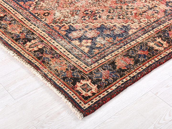 a large oriental rug on a white floor