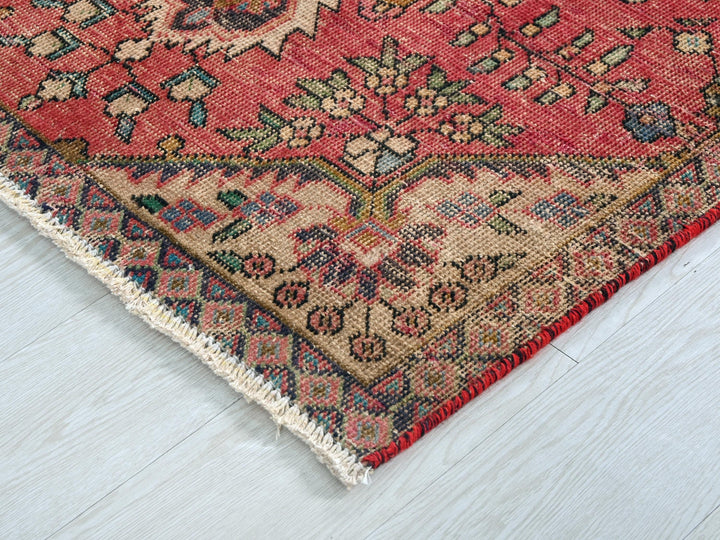 a close up of a rug on a white floor