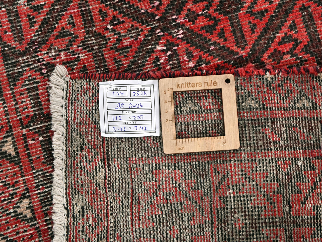 a piece of wood sitting on top of a rug