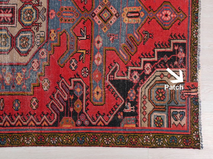 a close up of a rug on a wooden floor