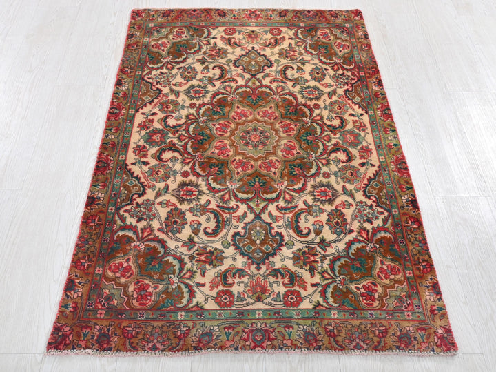 a large oriental rug on a white floor