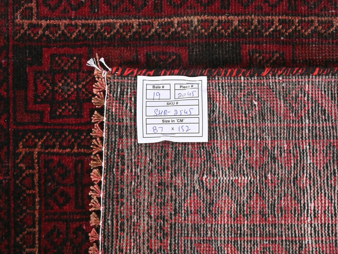 a piece of paper sitting on top of a rug