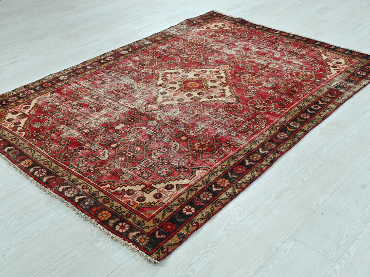 a large oriental rug on a white floor