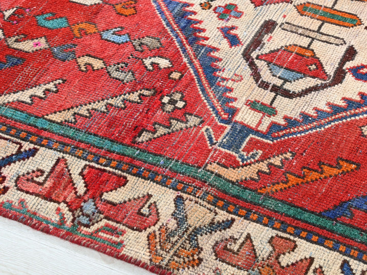 a close up of a rug on a wooden floor