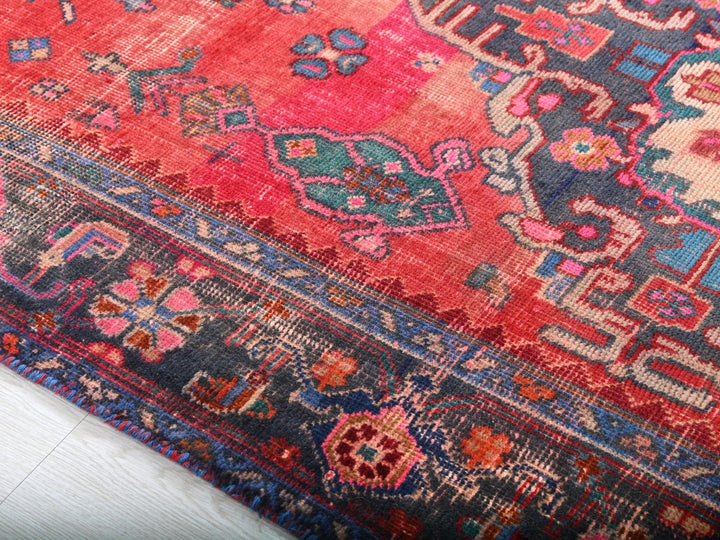 a colorful oriental rug is laying on the floor