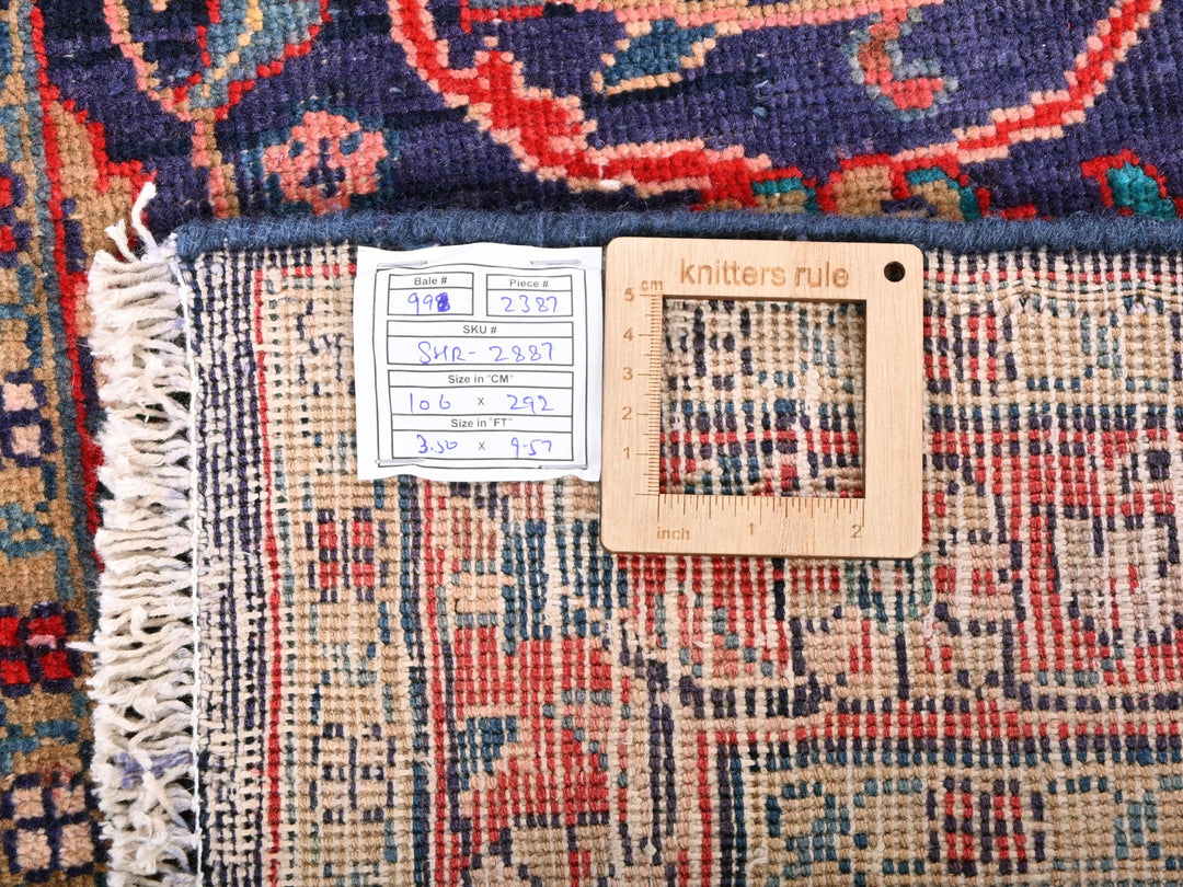 a piece of wood sitting on top of a rug