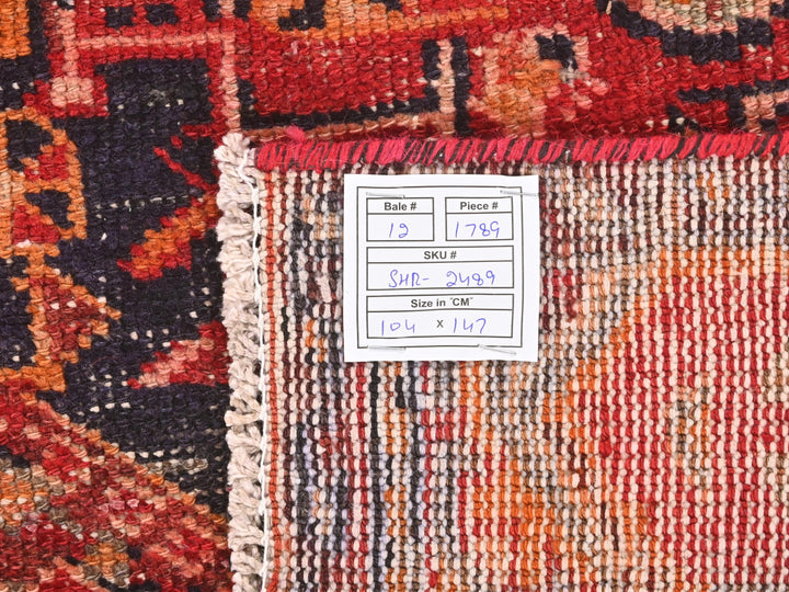 a close up of a rug with a tag on it