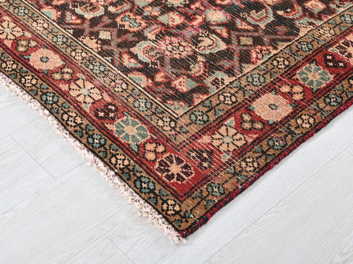 a large oriental rug on a white floor