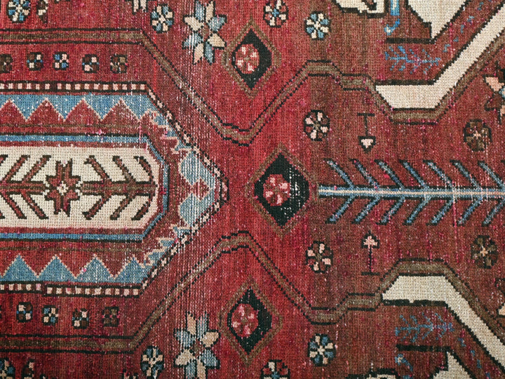 a close up of a rug with a pattern on it