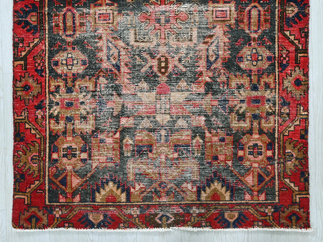 a rug with a red, blue, and yellow design