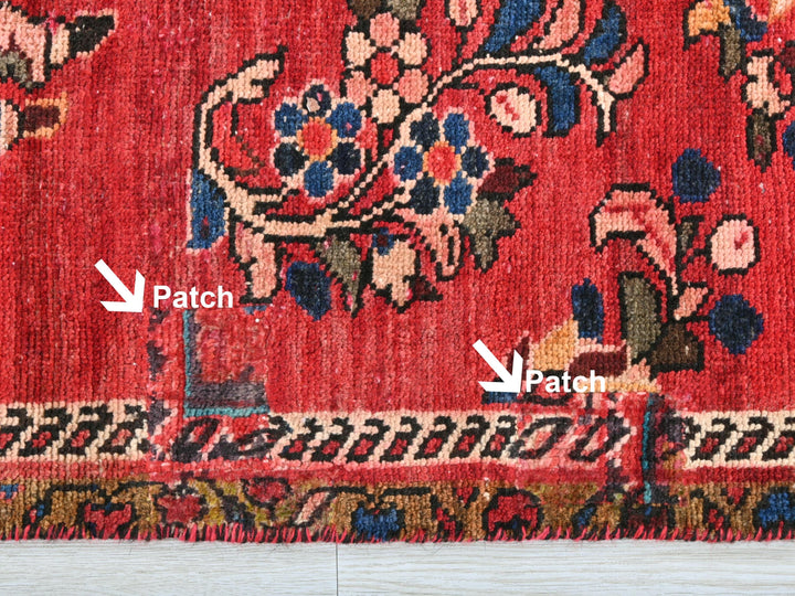 a close up of a rug with a patch on it